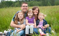 Josh Weed with his wife and children.