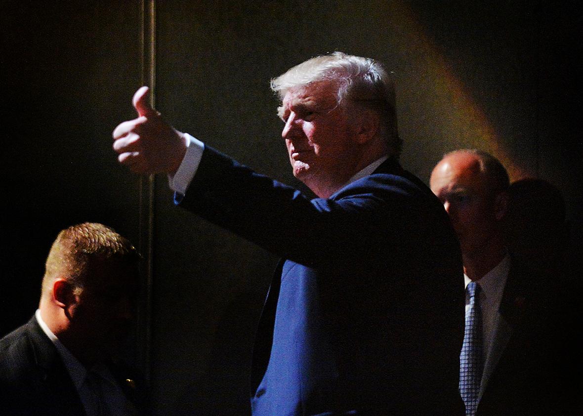 Presumptive Republican presidential nominee Donald Trump motions to the crowd while leaving the stage after a campaign event at the Duke Energy Center for the Performing Arts  on July 5, 2016 in Raleigh, North Carolina. 