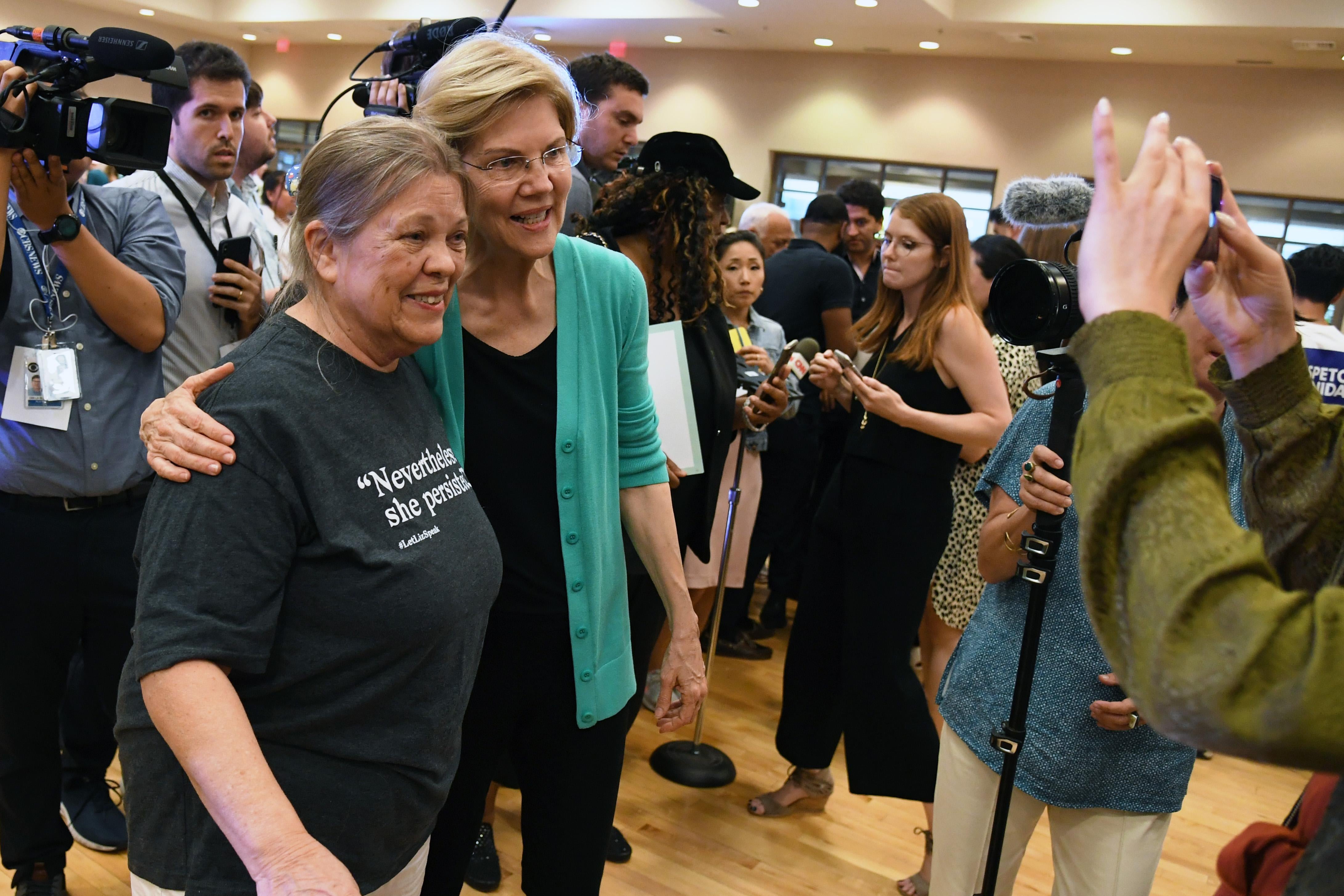 Marilyn Beilstein of Nevada poses for a photo with Democratic presidential candidate U.S. Sen. Elizabeth Warren on July 2 in Las Vegas.