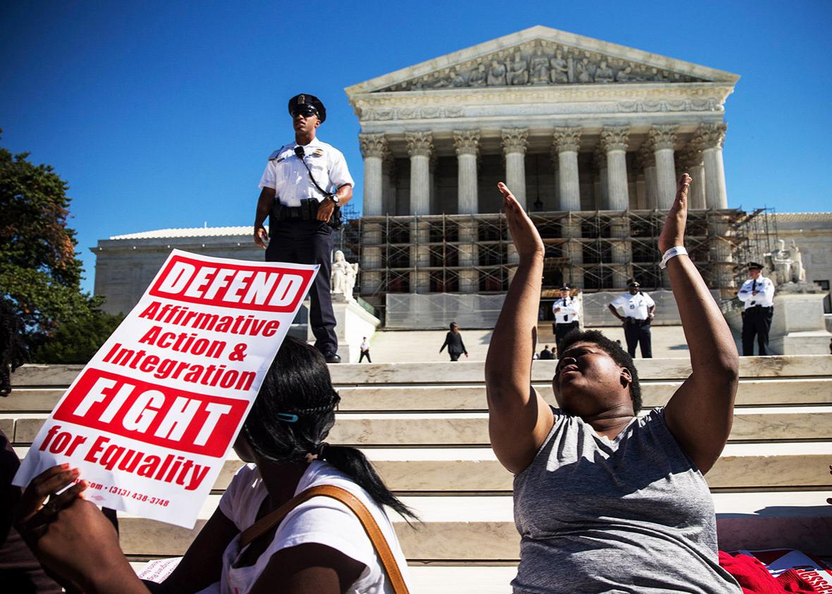 Students protest in support of affirmative action, outside the Supreme Court during the hearing of "Schuette v. Coalition to Defend Affirmative Action" on October 15, 2013 in Washington, DC. 