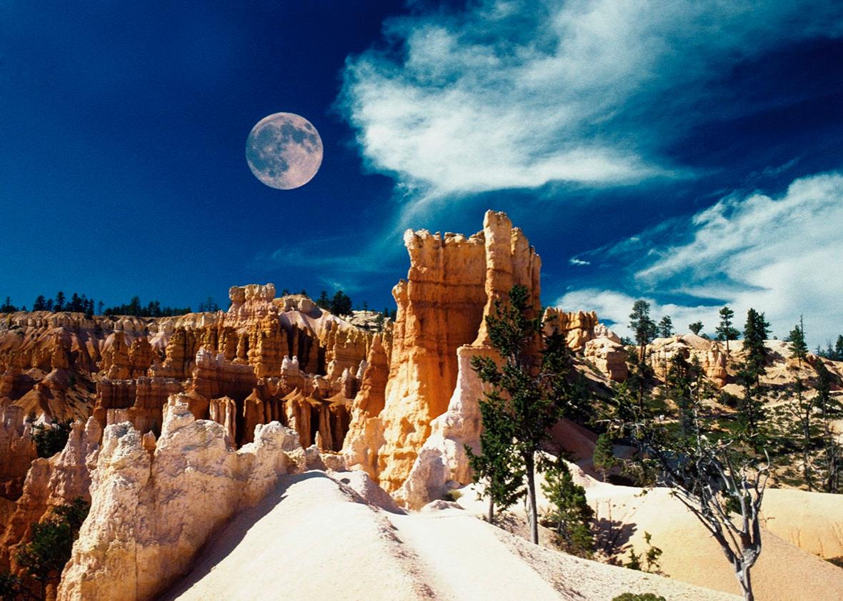 Moon over an arid landscape, Bryce Canyon National Park, Utah, USA.