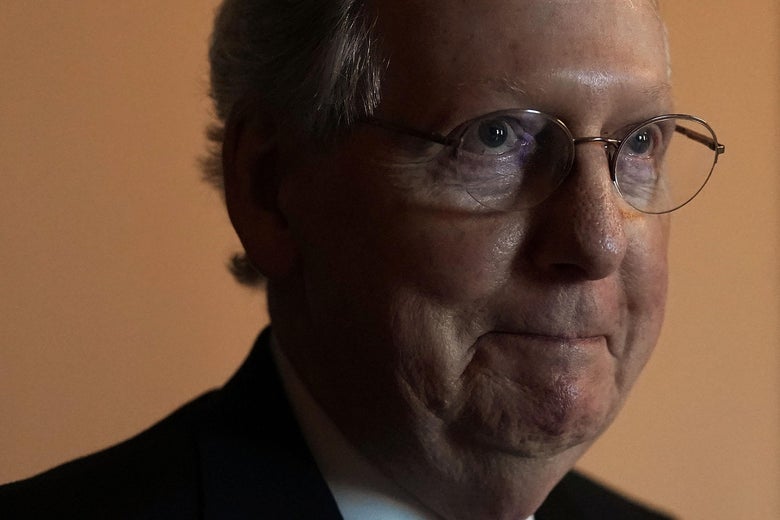  Senate Majority Leader Sen. Mitch McConnell smirks at the Capitol May 8, 2018 in Washington, DC.