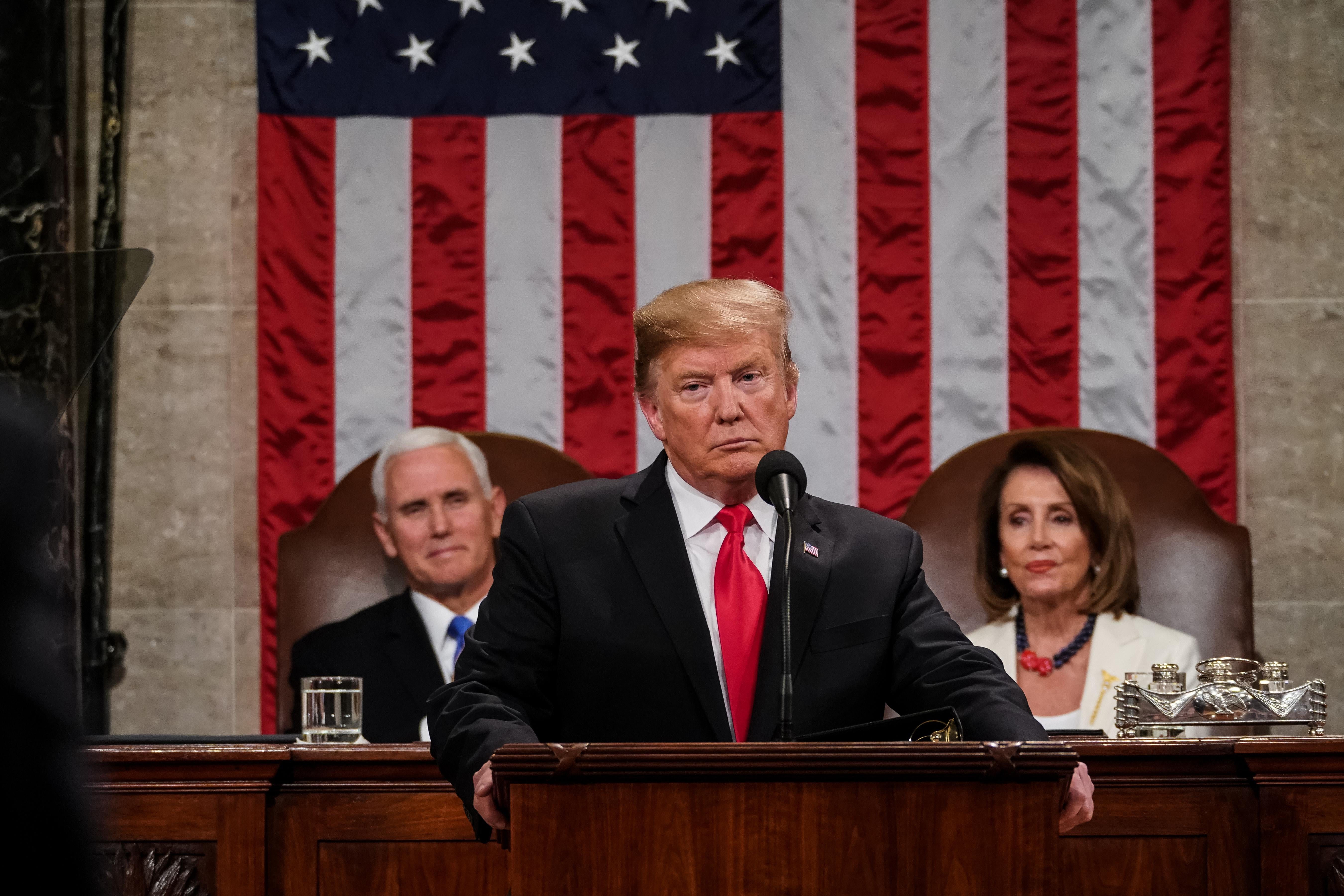 U.S. President Donald Trump, with Vice President Mike Pence and House Speaker Nancy Pelosi looking on, delivers the State of the Union address on Tuesday.