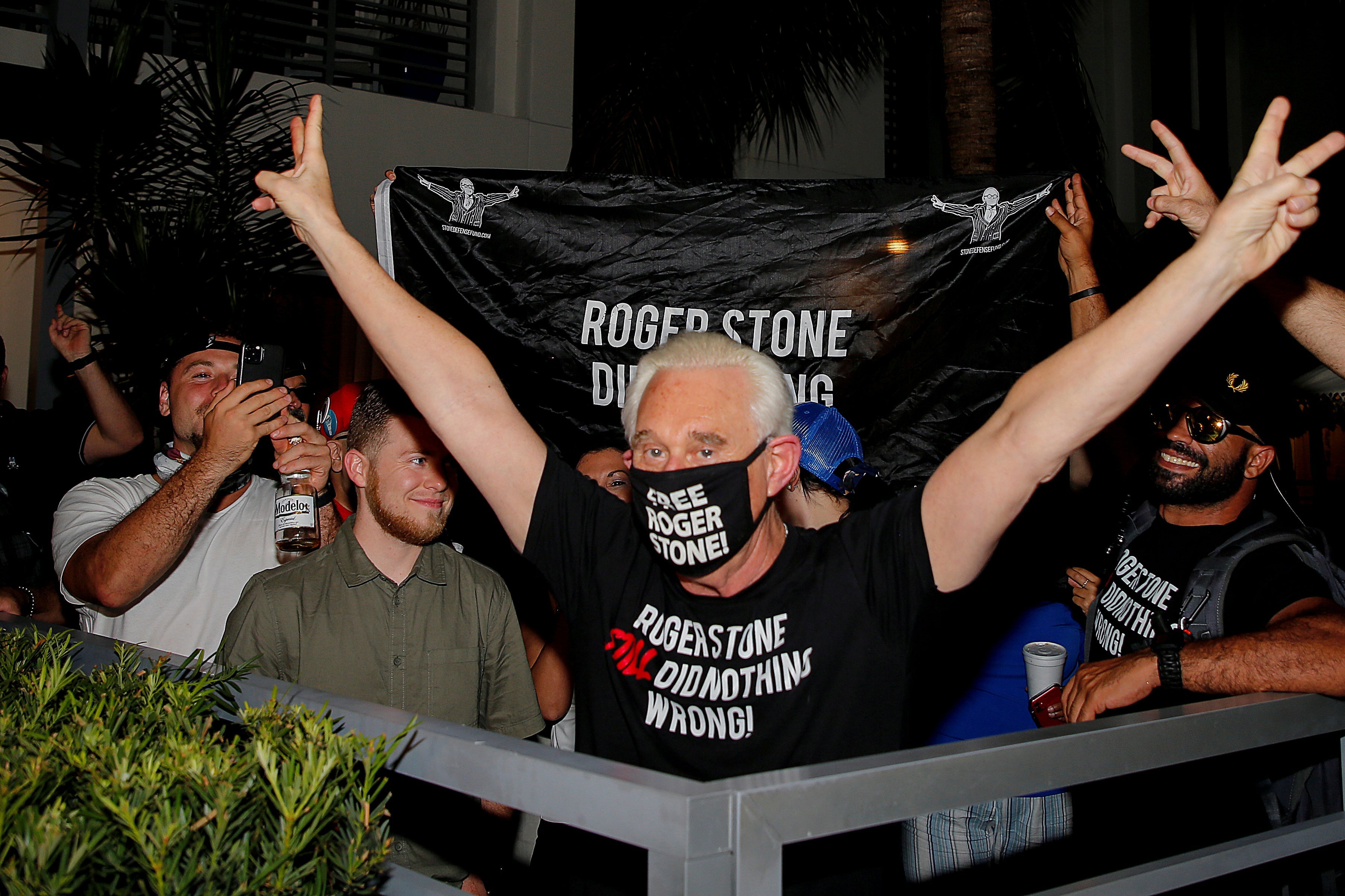 Roger Stone celebrates after President Donald Trump commuted his federal prison sentence, outside his home in Fort Lauderdale, Florida, on  July 10, 2020.
