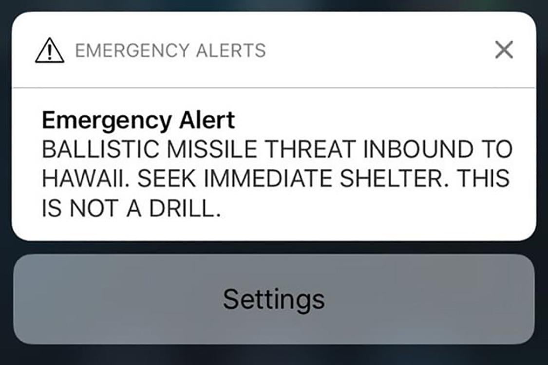 A screen shot take by Hawaiian citizen Alison Teal shows the screen of her mobile phone with an alert text message sent to all Hawaiian citizens on January 13, 2018. 
Hawaii officials swiftly confirmed a cell phone alert warning of an incoming ballistic missile was a 'false alarm' on January 13, 2018,  but not before the ominous message unnerved residents and stirred confusion across the US state. The warning -- which came across the Emergency Alert System that authorities nationwide use to delivery vital emergency information -- read: 'Ballistic missile threat inbound to Hawaii. Seek immediate shelter. This is not a drill.' / AFP PHOTO / Alison TEAL        (Photo credit should read ALISON TEAL/AFP/Getty Images)