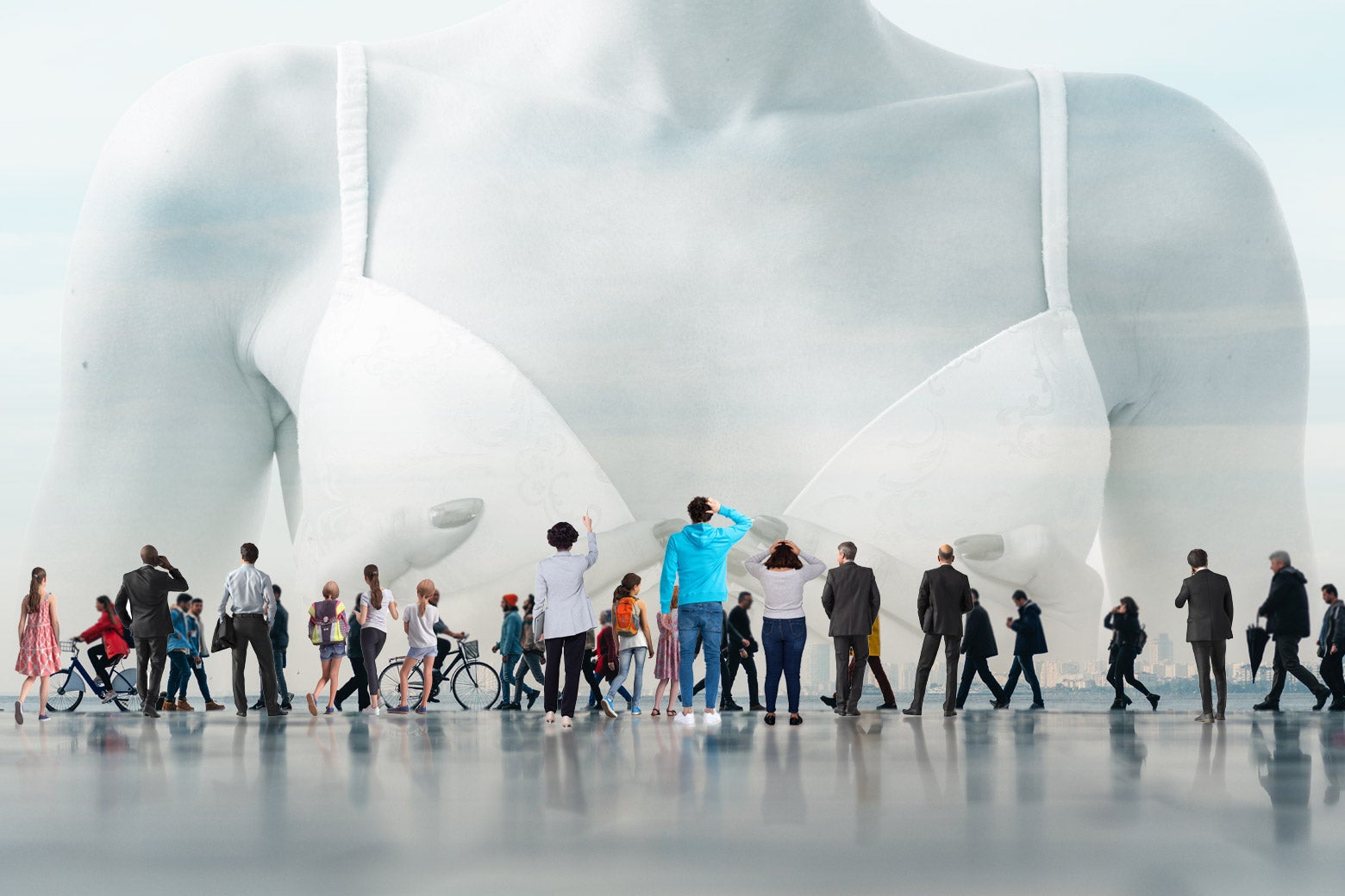 A crowd of people stands and stares at a giant looming female torso, bosom, or chest wearing a small bra from Pepper. 