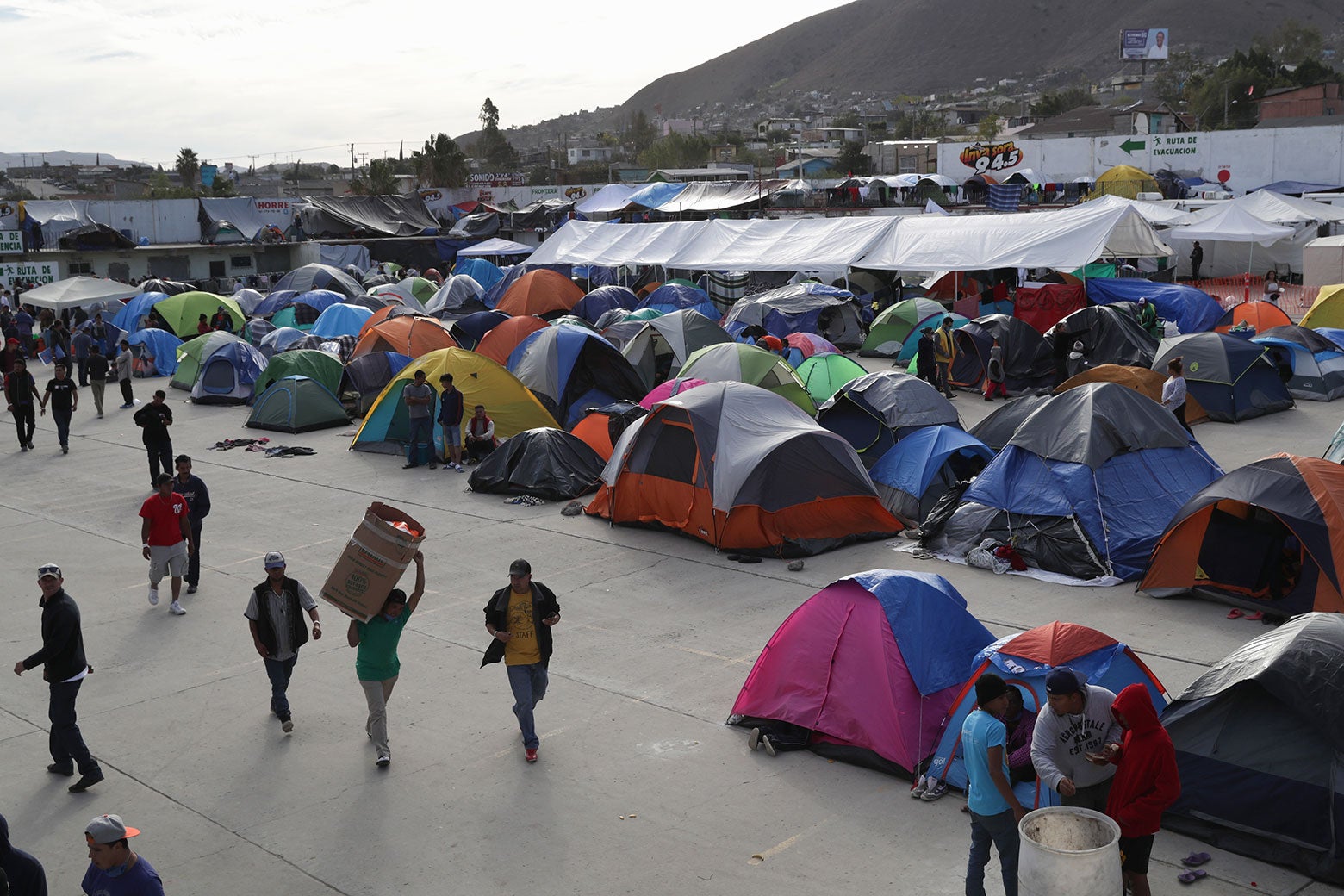 Immigrants spend the afternoon inside the Barretal migrant camp on Dec. 4, 2018 from Tijuana, Mexico.