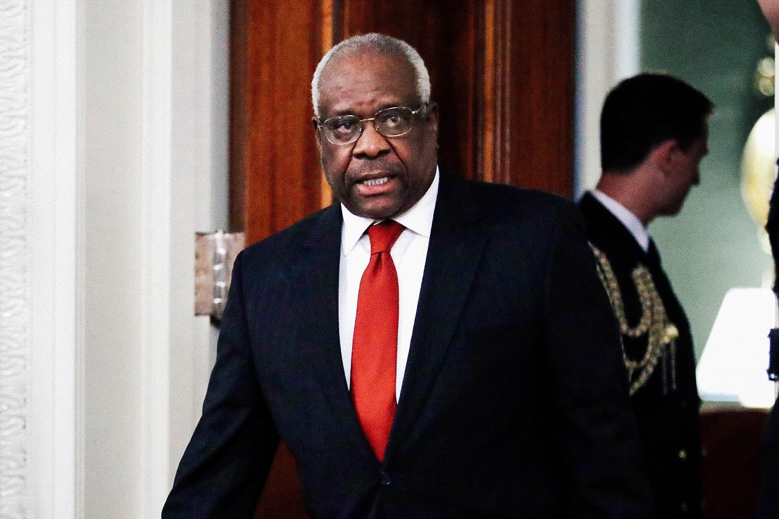 Clarence Thomas in a suit.