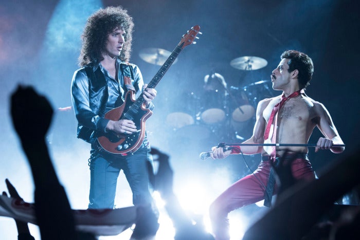 Two men performing on stage.