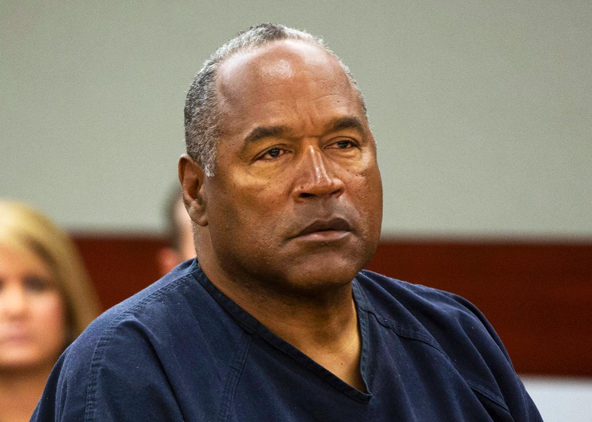 O.J. Simpson listens to audio recording played during an evidentiary hearing for O.J. Simpson in Clark County District Court in Clark County District Court May 16, 2013 in Las Vegas, Nevada. 