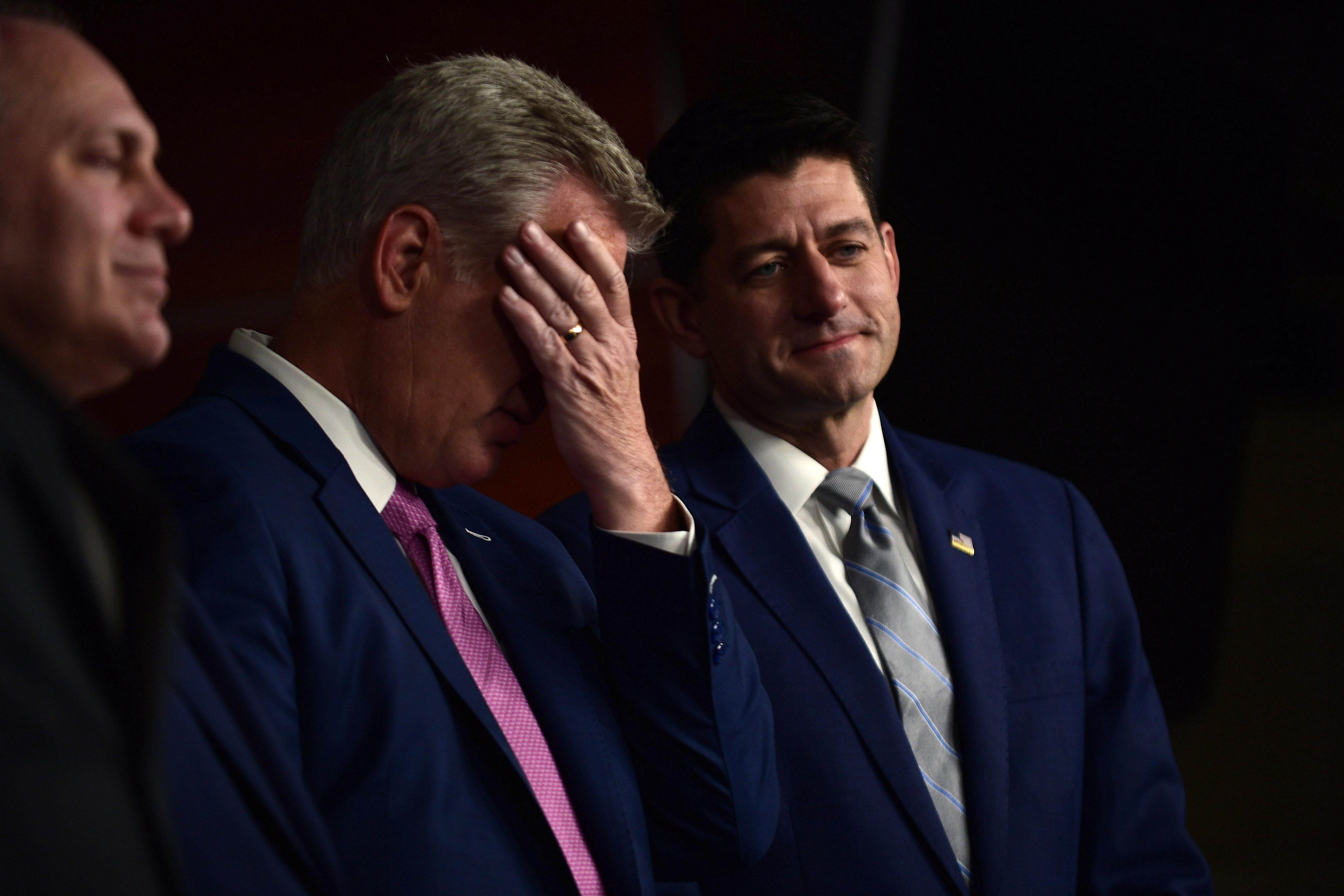 House Majority Leader Kevin Owen McCarthy, Republican Congressman for California's 23rd district, covers his face while standing next to House Speaker Paul Ryan (R-WI) during the speaker's weekly news conference at the U.S. Capitol on September 13, 2018 in Washington, D.C. 
