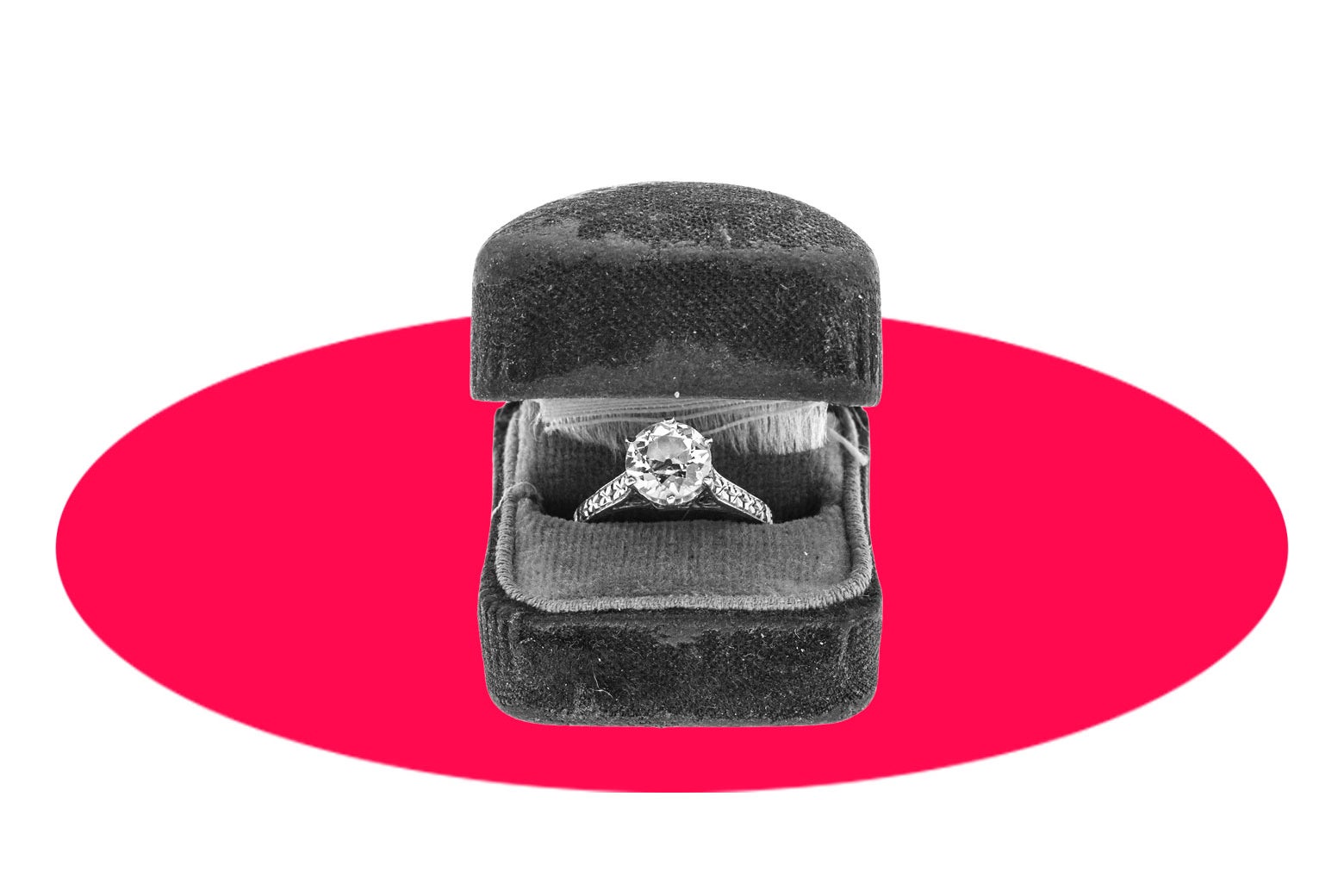 Engagement ring in a box.