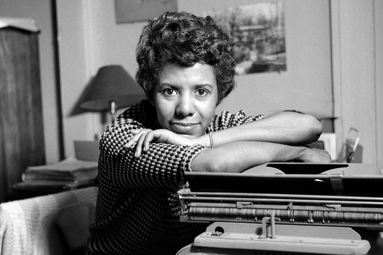Writer and playwright Lorraine Hansberry poses for a portrait in her apartment in 1959 in New York. 