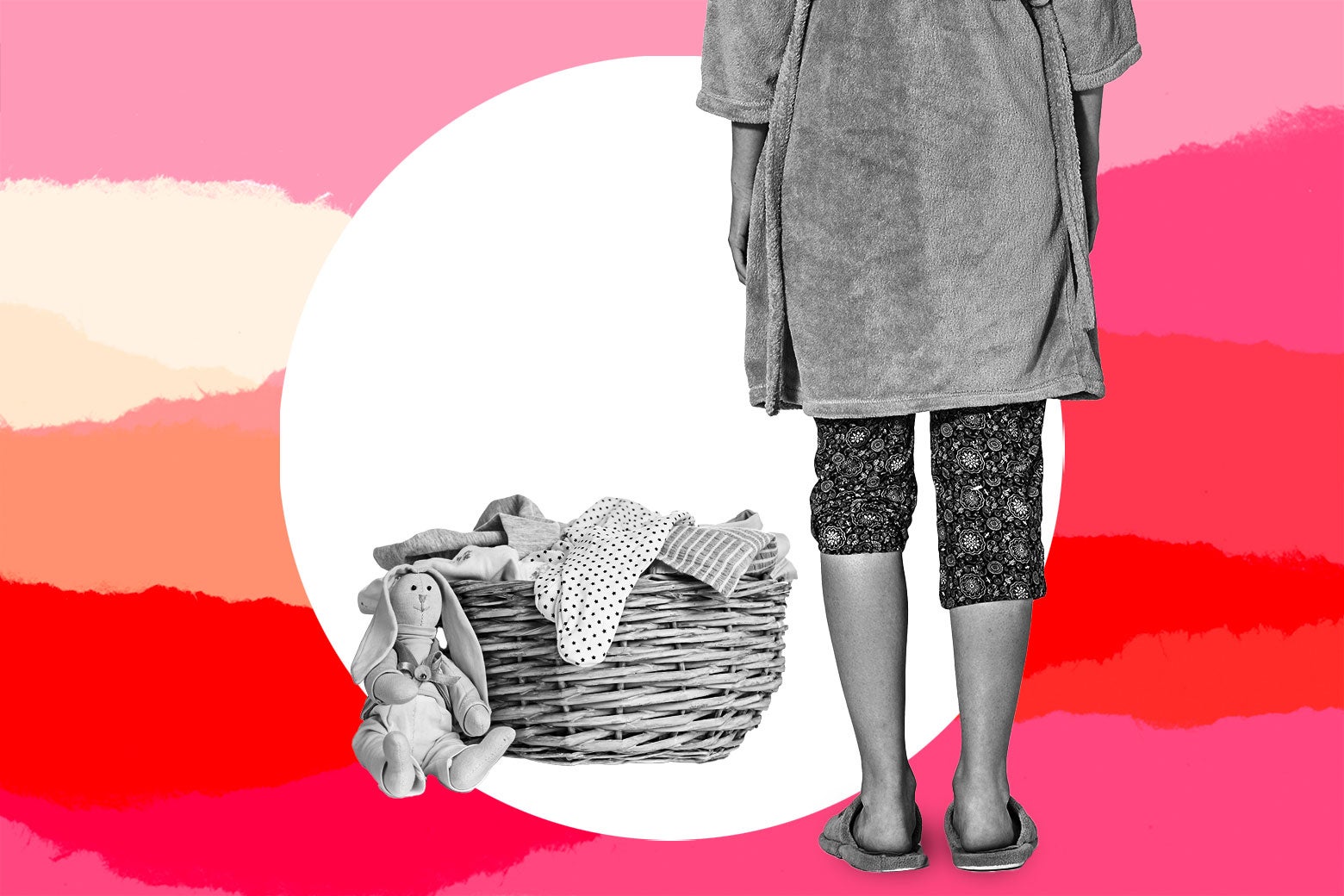 A woman stands in her slippers next to a basket of laundry.
