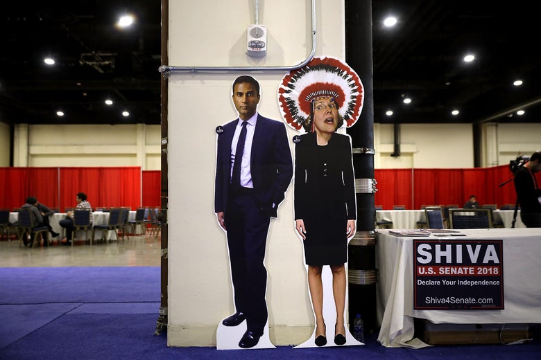 A booth in support of Shiva Ayyadurai, who is running against Sen. Elizabeth Warren (D-MA), displays a photoshopped image of Warren wearing a Native American headdress inside the Conservative Political Action Conference on February 23, 2018 in National Harbor, Maryland.