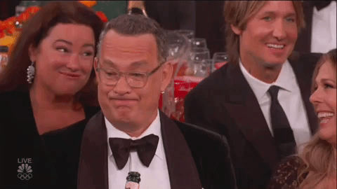 Tom Hanks making an unamused expression.