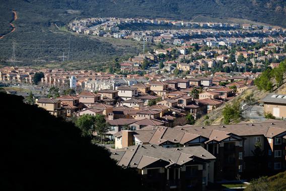 The sprawl of new housing is shown in the hills of San Marcos, California, January 30, 2013. 