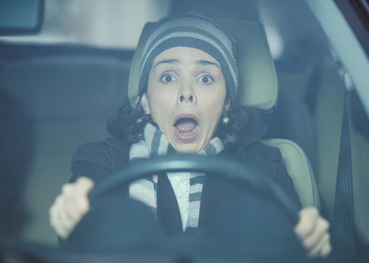 panicked behind the wheel.