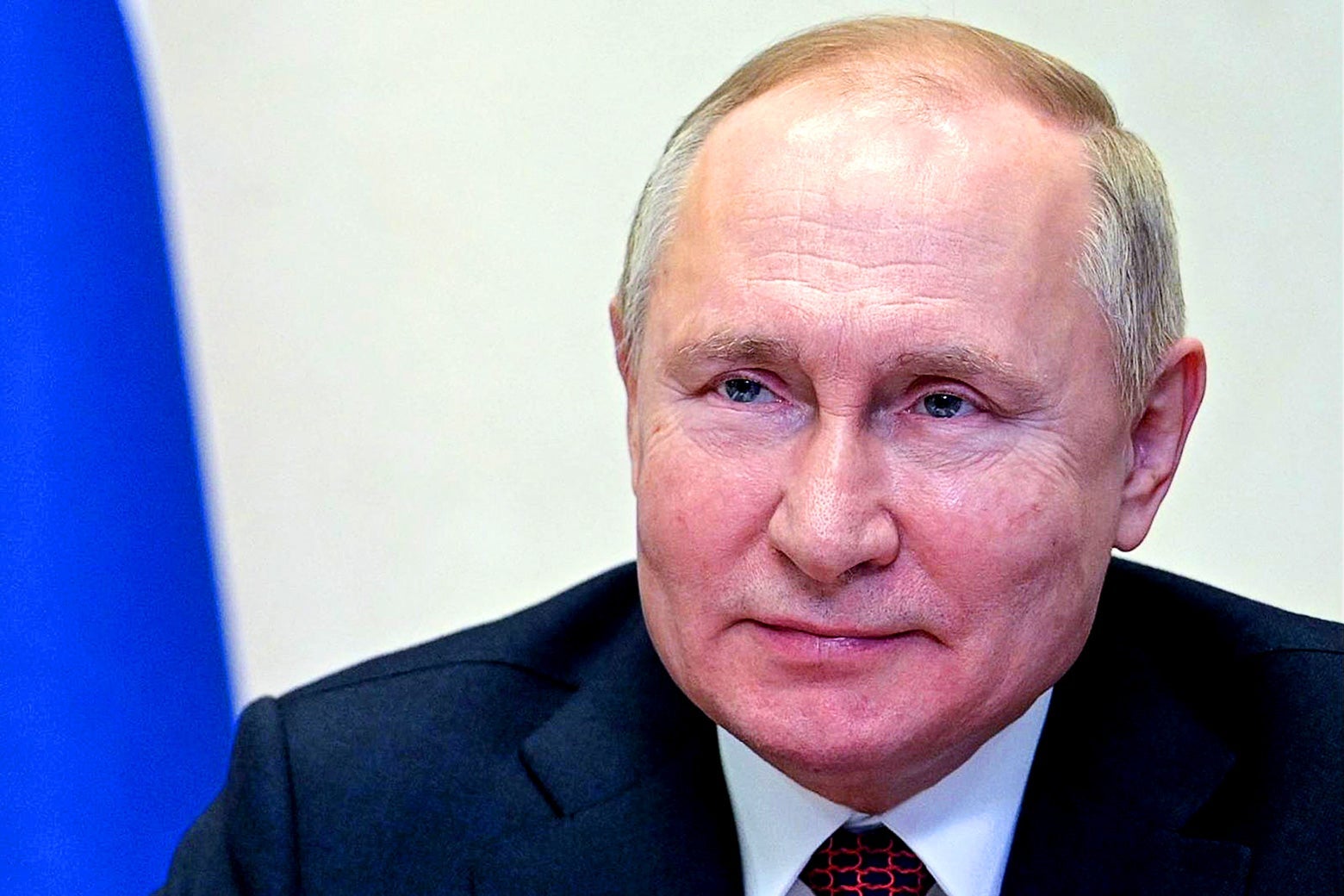 A close-up of President Vladimir Putin's face.