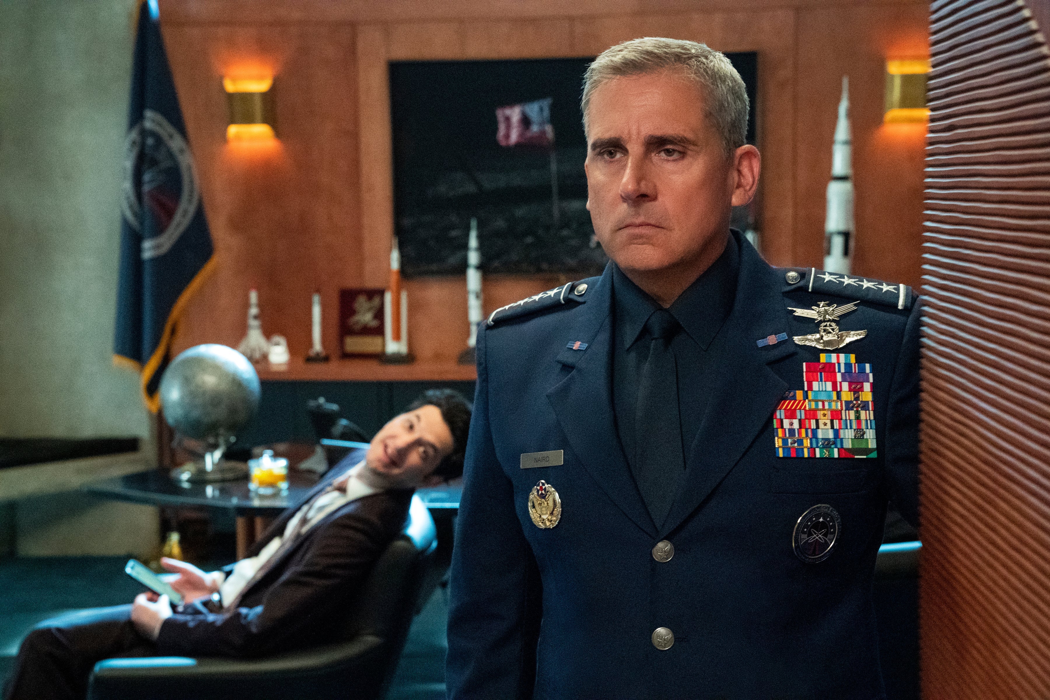 Steve Carell, in military uniform, stares glumly into the distance.