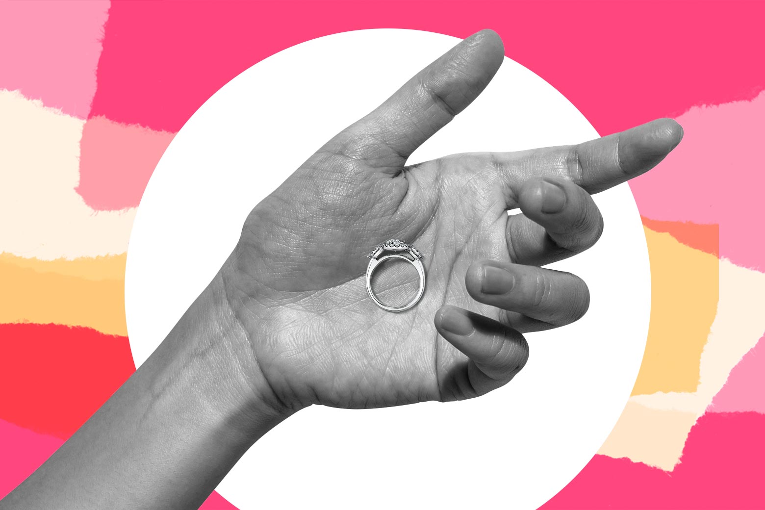 A ring rests in a hand.