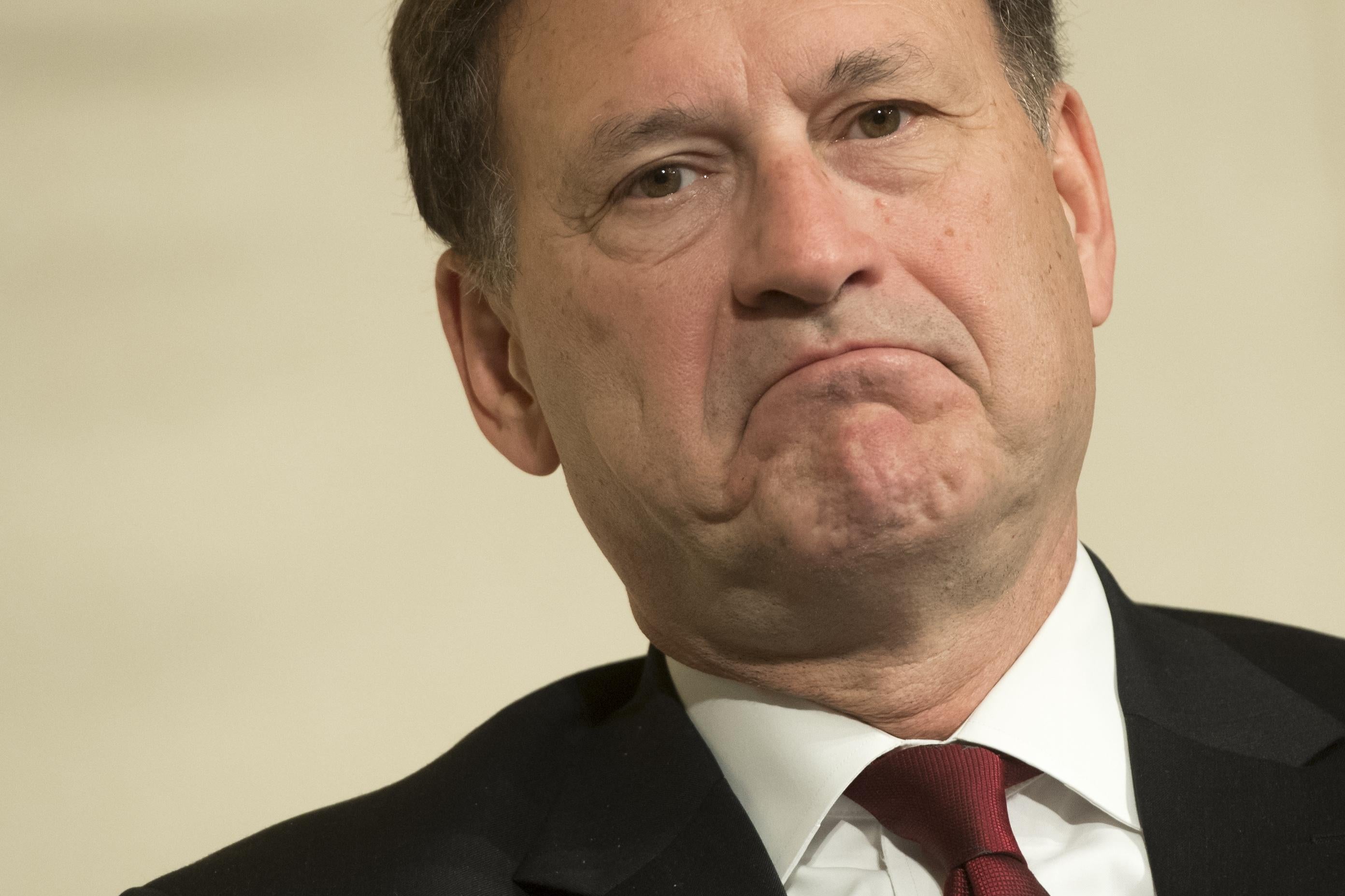 Alito makes a frowny face.