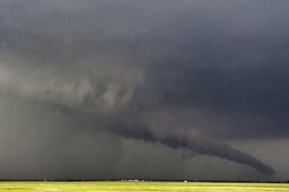 The funnel of a tornadic thunderstorm almost touches the ground near South Haven, in Kansas May 19, 2013. 