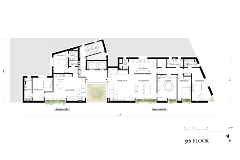 Floor plan of two units connected by a single stair