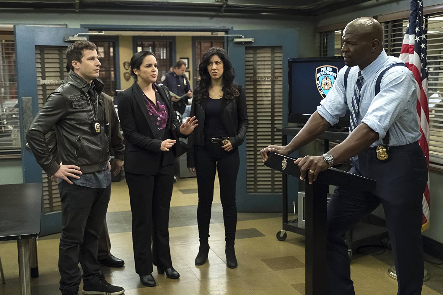 Terry Crews gives a speech at the precinct while the others look on