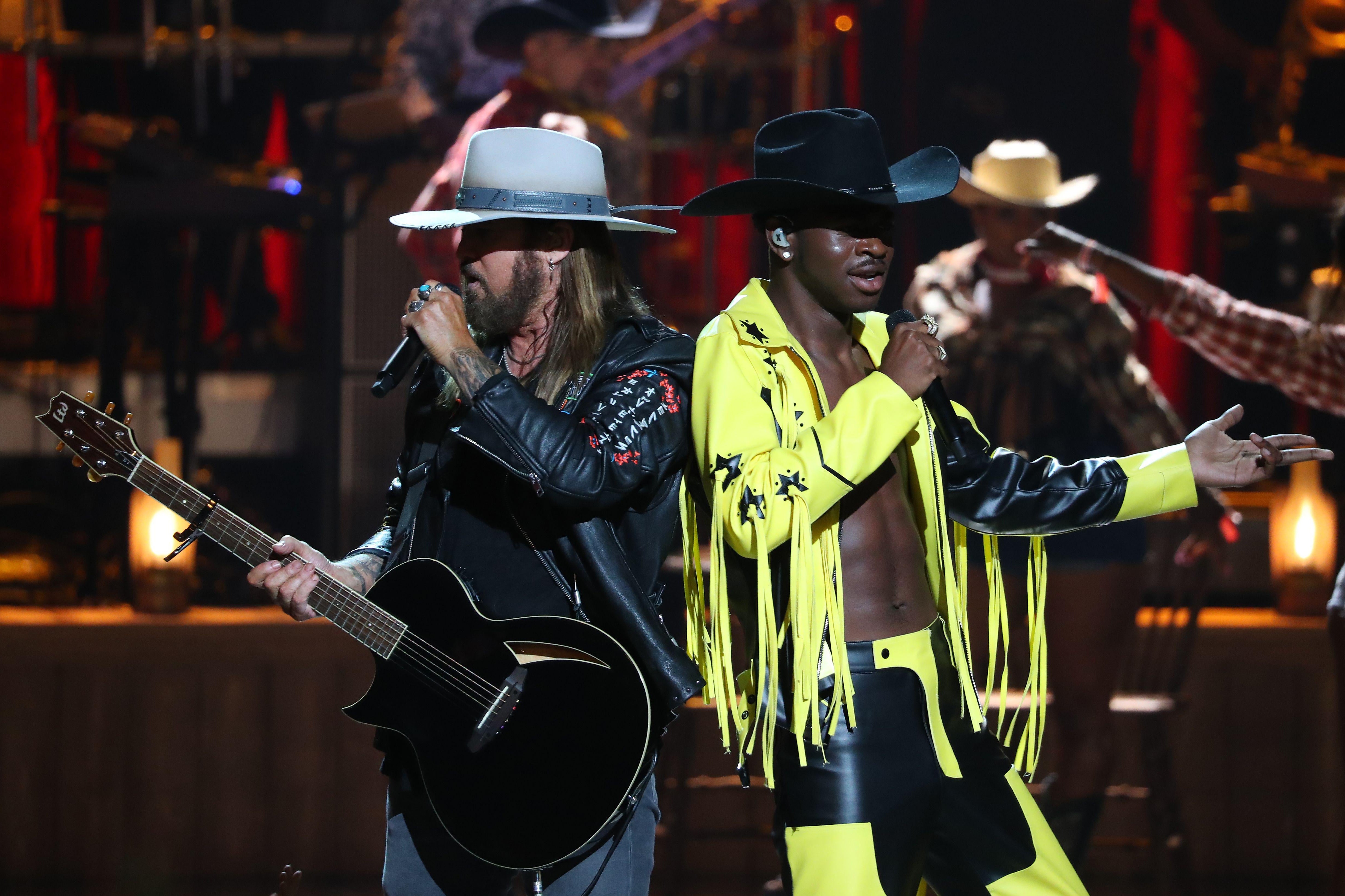 Billy Ray Cyrus (L) and Lil Nas X perform onstage during the 2019 BET awards at Microsoft Theater in Los Angeles, California on June 23, 2019. (Photo by Jean-Baptiste LACROIX / AFP)        (Photo credit should read JEAN-BAPTISTE LACROIX/AFP/Getty Images)