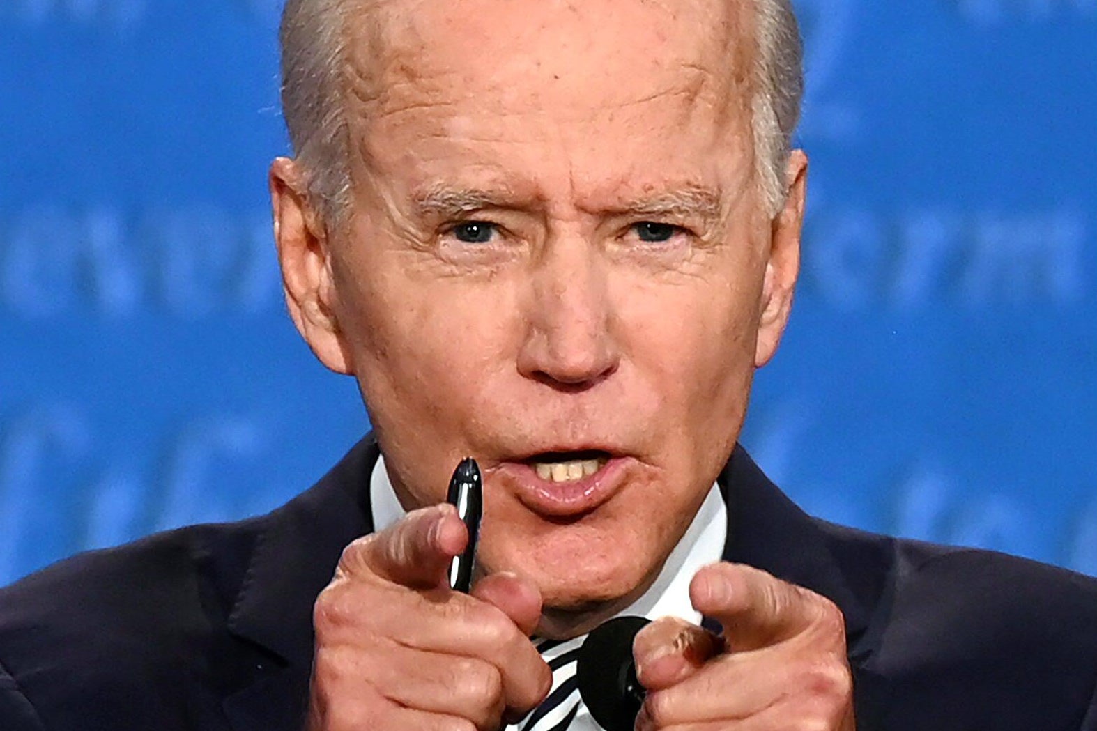 Joe Biden pointing at the camera with two hands during the first presidential debate.