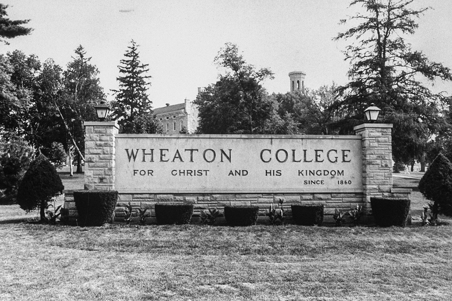 A sign for Wheaton College, which reads "Wheaton College for christ and his kingdom since 1860."
