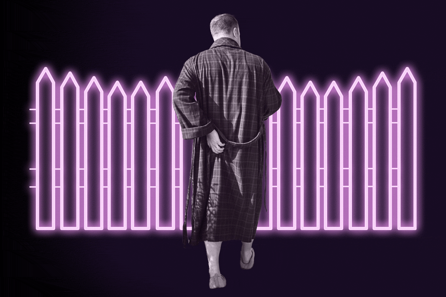 Man in a bathrobe walking toward a fence.