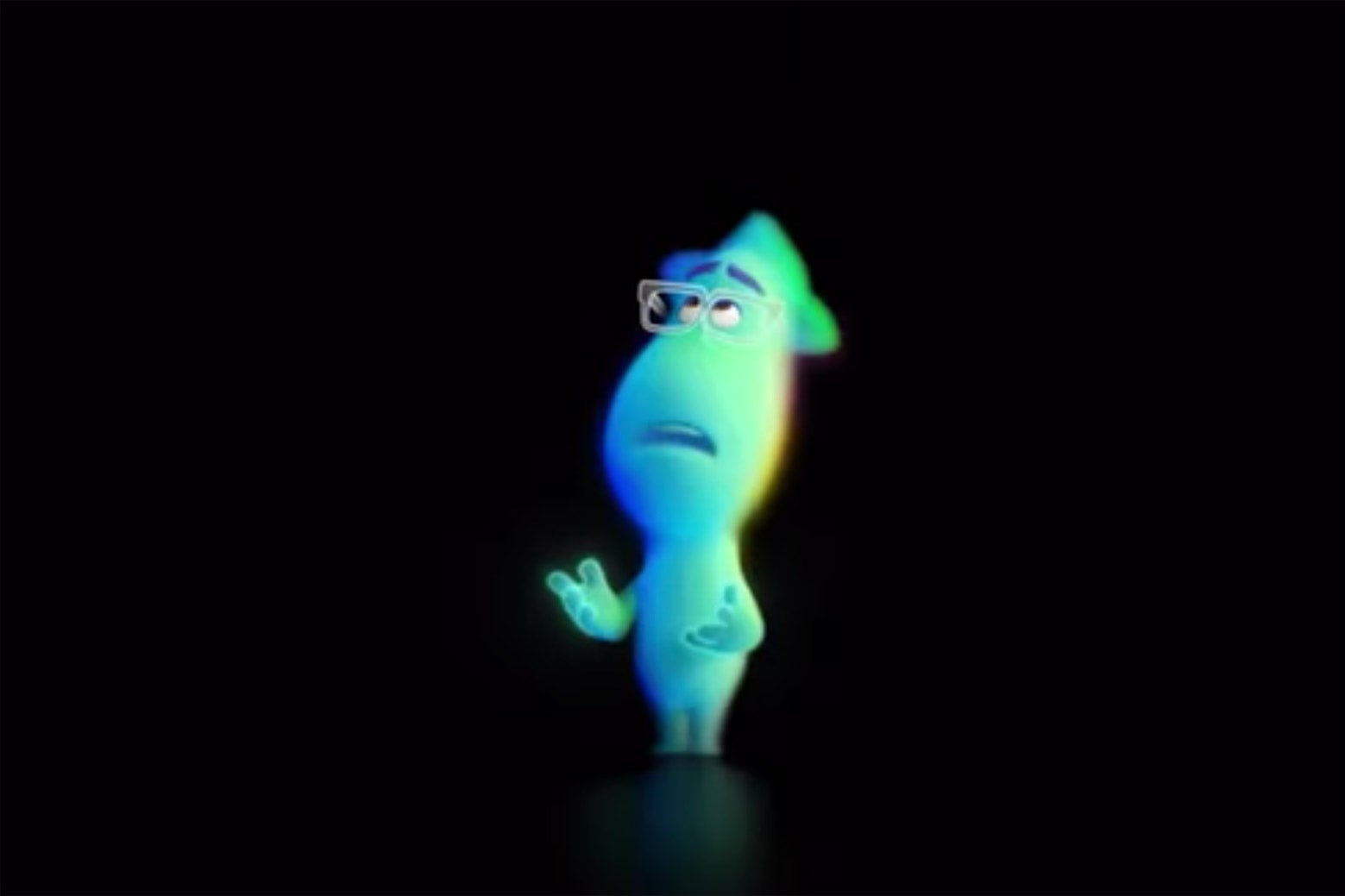 A greenish-blue blob character in glasses and a fedora stands in a black void.