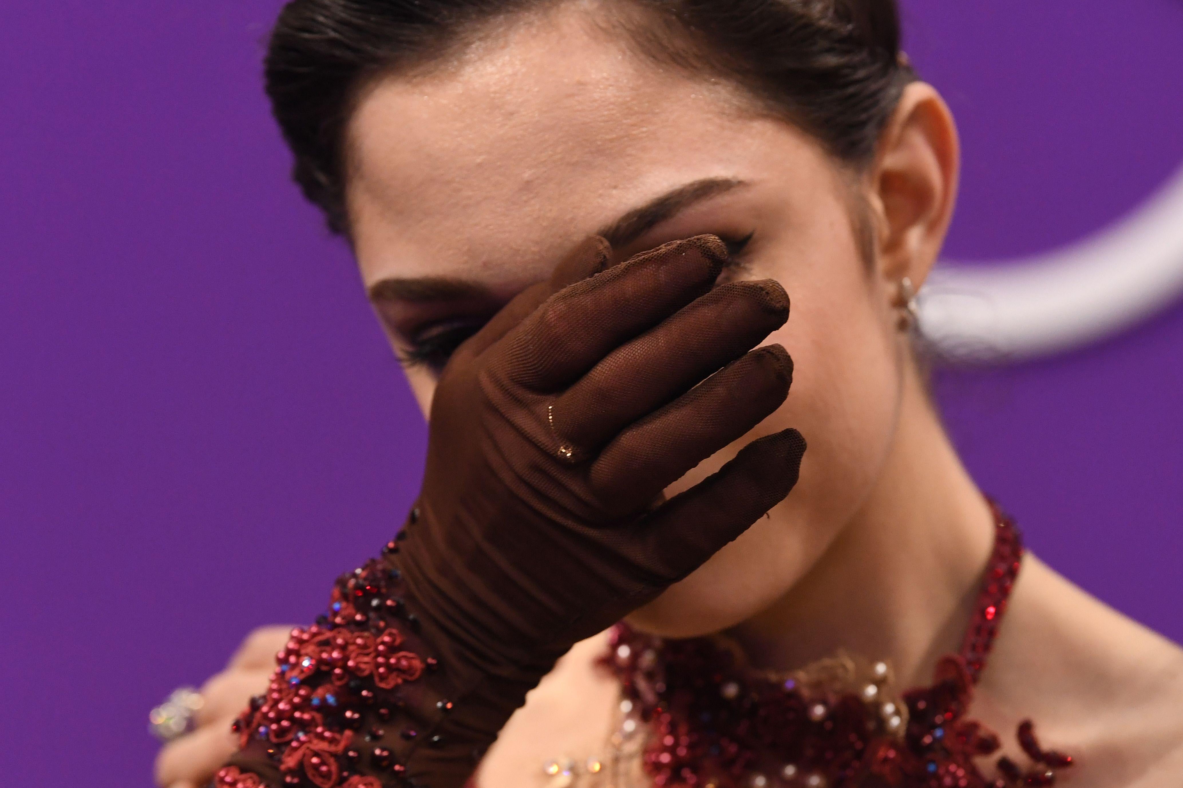 Russia's Evgenia Medvedeva reacts after the women's single skating free skating of the figure skating event during the Pyeongchang 2018 Winter Olympic Games at the Gangneung Ice Arena in Gangneung on February 23, 2018. / AFP PHOTO / Roberto SCHMIDT        (Photo credit should read ROBERTO SCHMIDT/AFP/Getty Images)