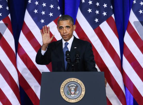 President Obama waves after speaking about the National Security Agency (NSA).
