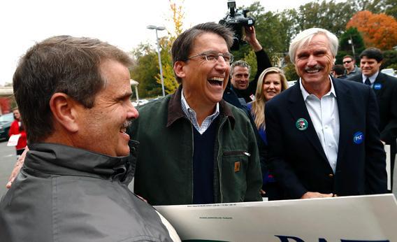 North Carolina Governor Pat McCrory meets supporters outside Myers Park Traditional Elementary school during the U.S. presidential election in Charlotte.