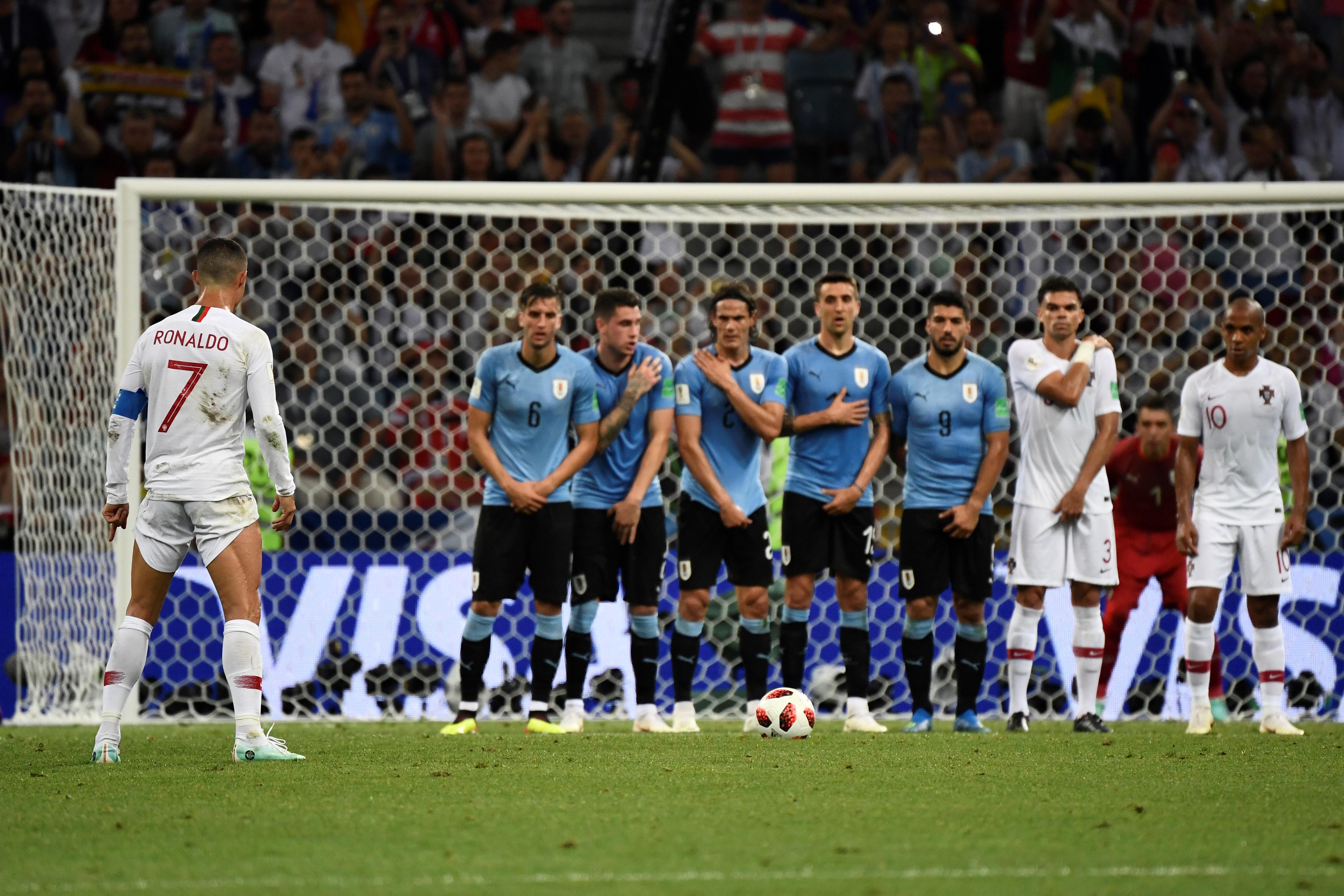 Portugal's forward Cristiano Ronaldo gets ready to kick a free kick.