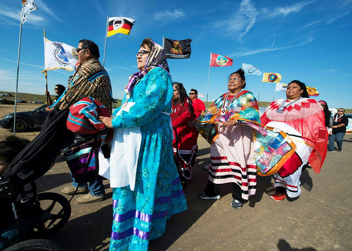 Members of Colorado River Indian tribes arrive in a procession at a protest encampment near Cannon Ball, North Dakota to lend their support to the Standing Rock Sioux Tribe's opposition to the Dakota Access Pipeline (DAPL) September 3, 2016.
