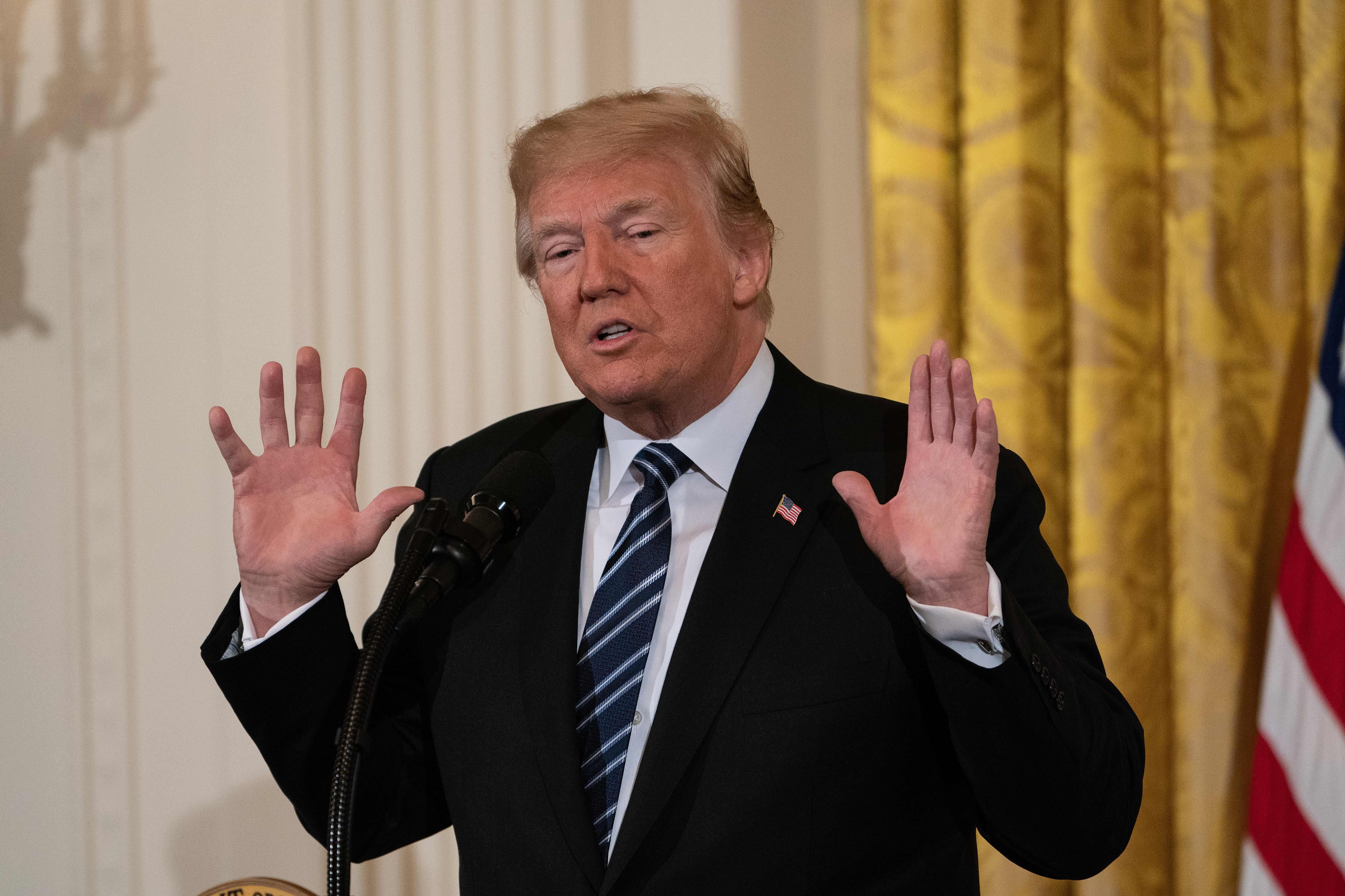 US President Donald Trump addresses a meeting on prison reform at the White House in Washington, DC, on May 18, 2018. (Photo by NICHOLAS KAMM / AFP)        (Photo credit should read NICHOLAS KAMM/AFP/Getty Images)