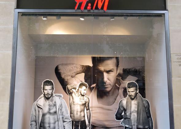 David Beckham clothes models in a store window.