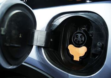 The charging port of the new Chevy Bolt EV, an electric car with a battery range of 200 miles, priced at $30,000, and will be in production this year, is seen after a keynote address at CES 2016 at the Westgate Las Vegas Resort & Casino on January 6, 2016 in Las Vegas, Nevada. 