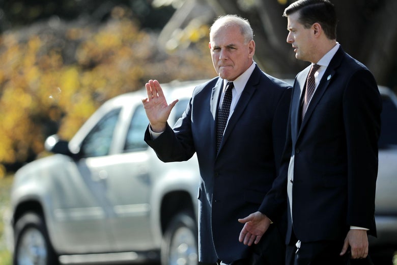 White House Chief of Staff John Kelly (L) and Staff Secretary Rob Porter leave the White House on Nov. 29, 2017.