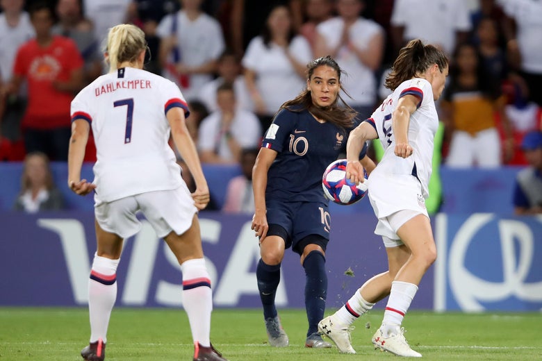 Kelley O'Hara's arm making her body unnaturally bigger.