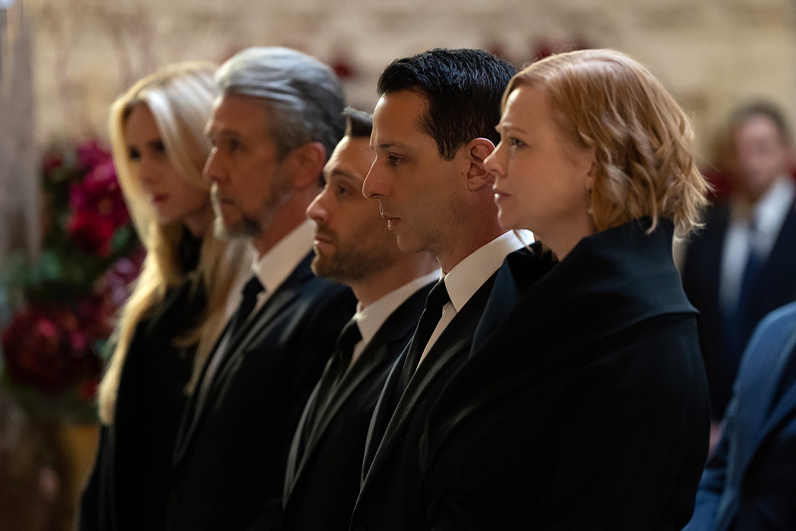 Willa, Connor, Roman, Kendall, and Shiv lined up, dressed in black for a funeral.