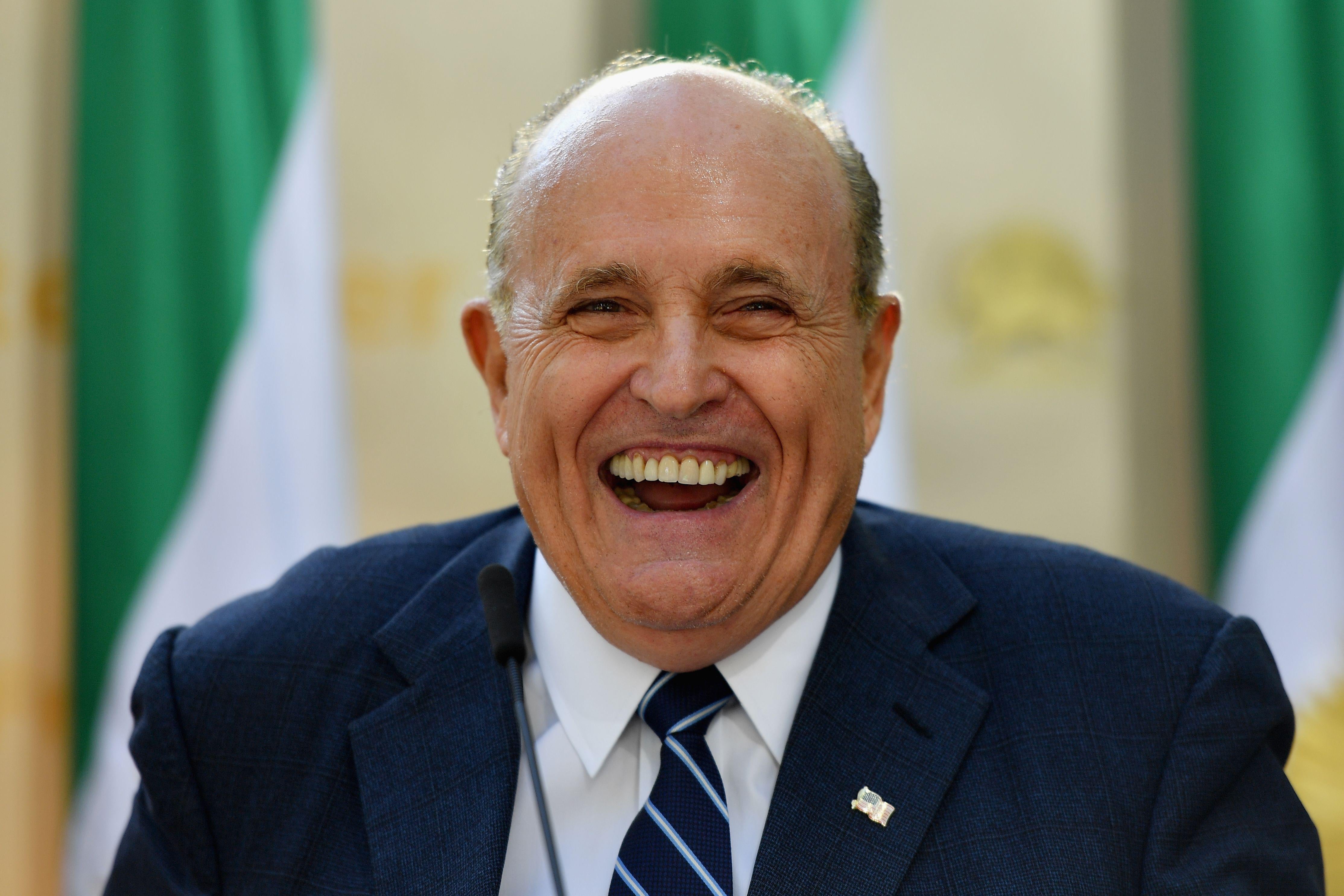 Rudy Giuliani speaks to the Organization of Iranian American Communities during their march to urge "recognition of the Iranian people's right for regime change," outside the United Nations Headquarters in New York on September 24, 2019.