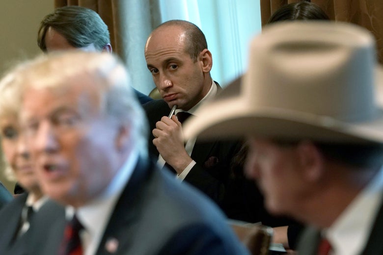 Donald Trump speaks while Stephen Miller listens in the background.
