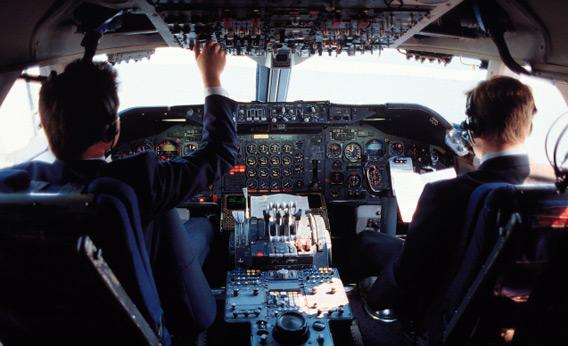Pilots in cockpit.