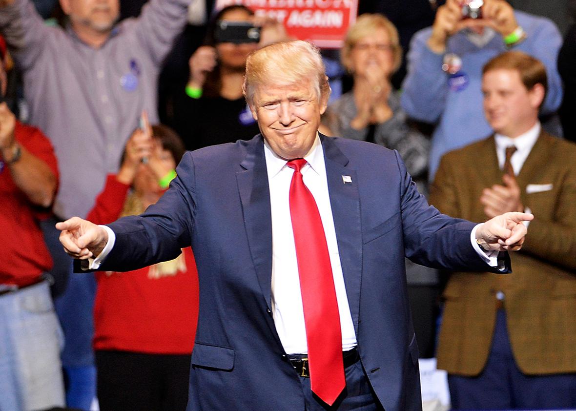 President-elect Donald Trump points to his supporters during his "Thank You" rally at Crown Coliseum on December 6, 2016 in Fayetteville, North Carolina.