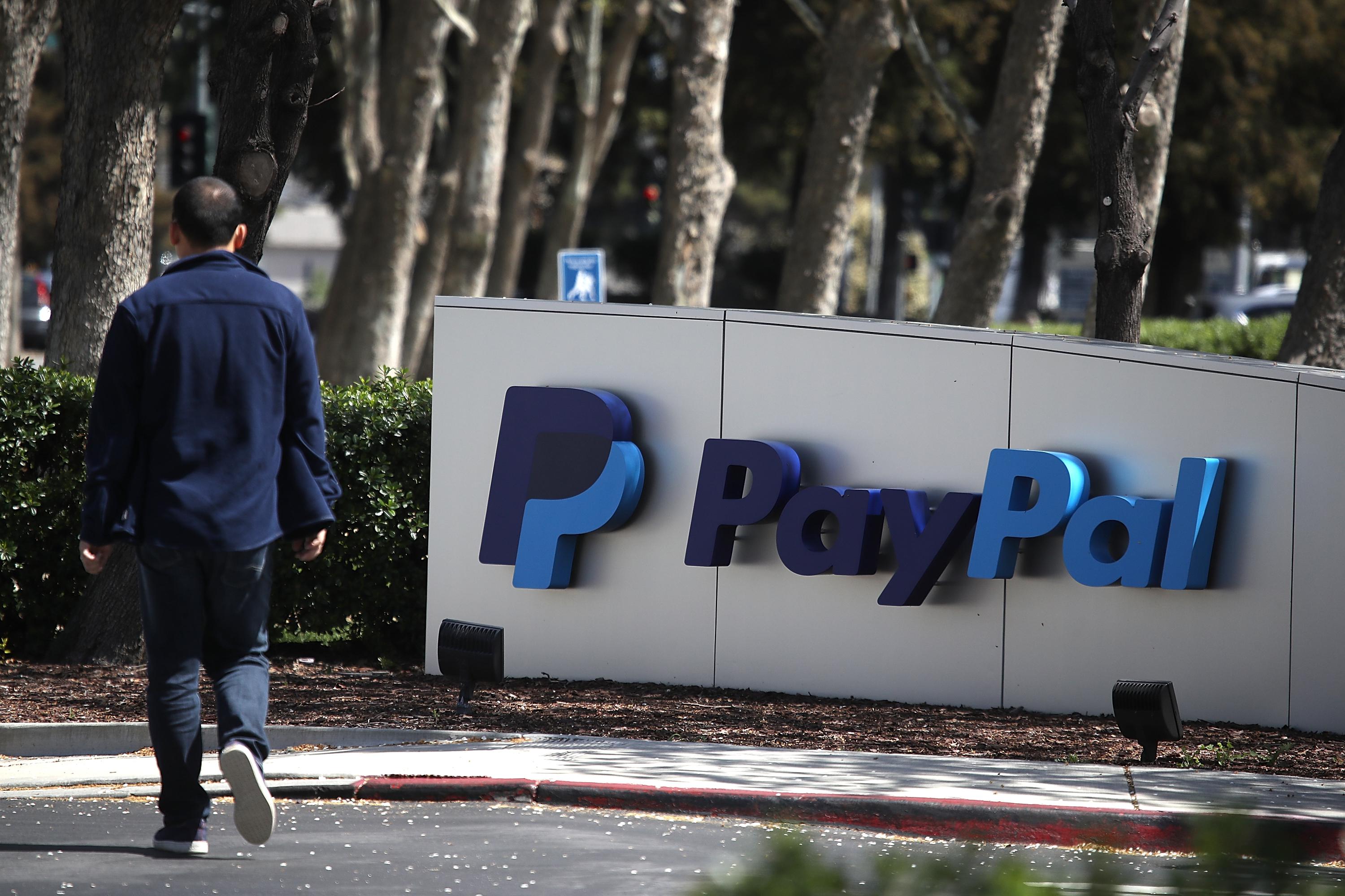 A PayPal sign is posted outside of the company's headquarters.